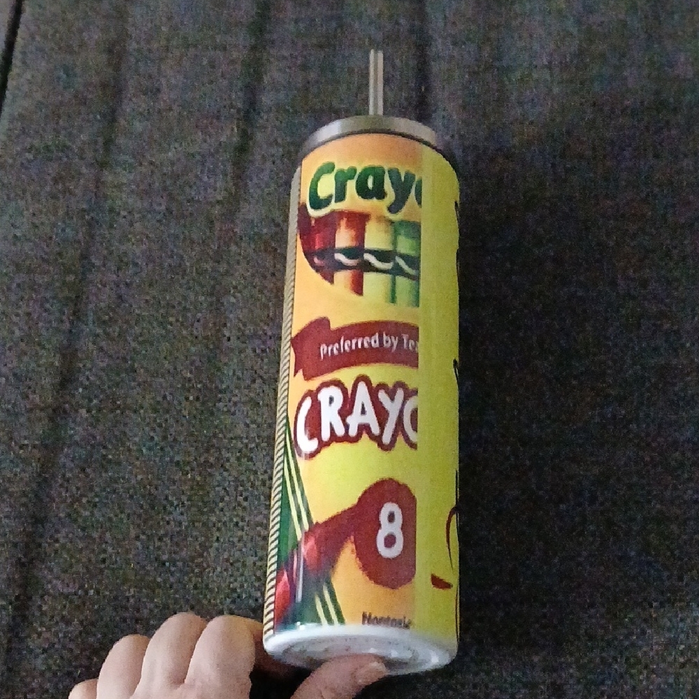 Crayola Colorful Crayola  drinking 20 oz Hogg tumbler w/ Yellow and Red Design.